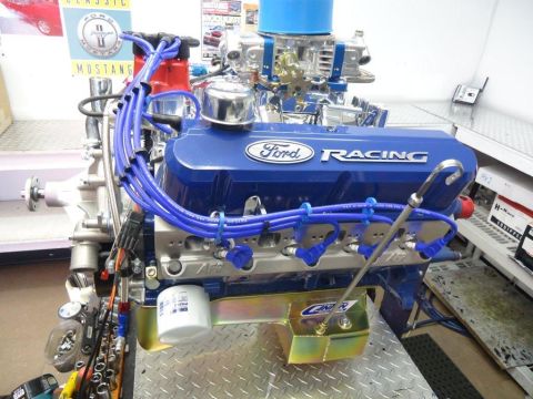 1982 Ford Bronco - Custom Ford Racing engine assembly, likely a performance upgrade, with prominent "Ford Racing" branding on the valve covers.
