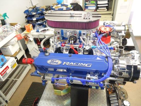 1982 Ford Bronco - Custom Ford Racing engine assembly, likely a performance build, with prominent "Ford Racing" branding on the valve covers.