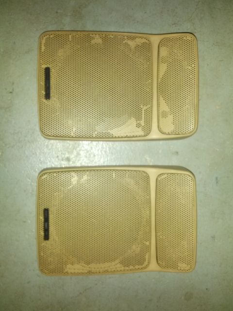 1989 BMW 3 Series - Two tan speaker grilles are shown, likely interior car parts, with visible wear and tear.