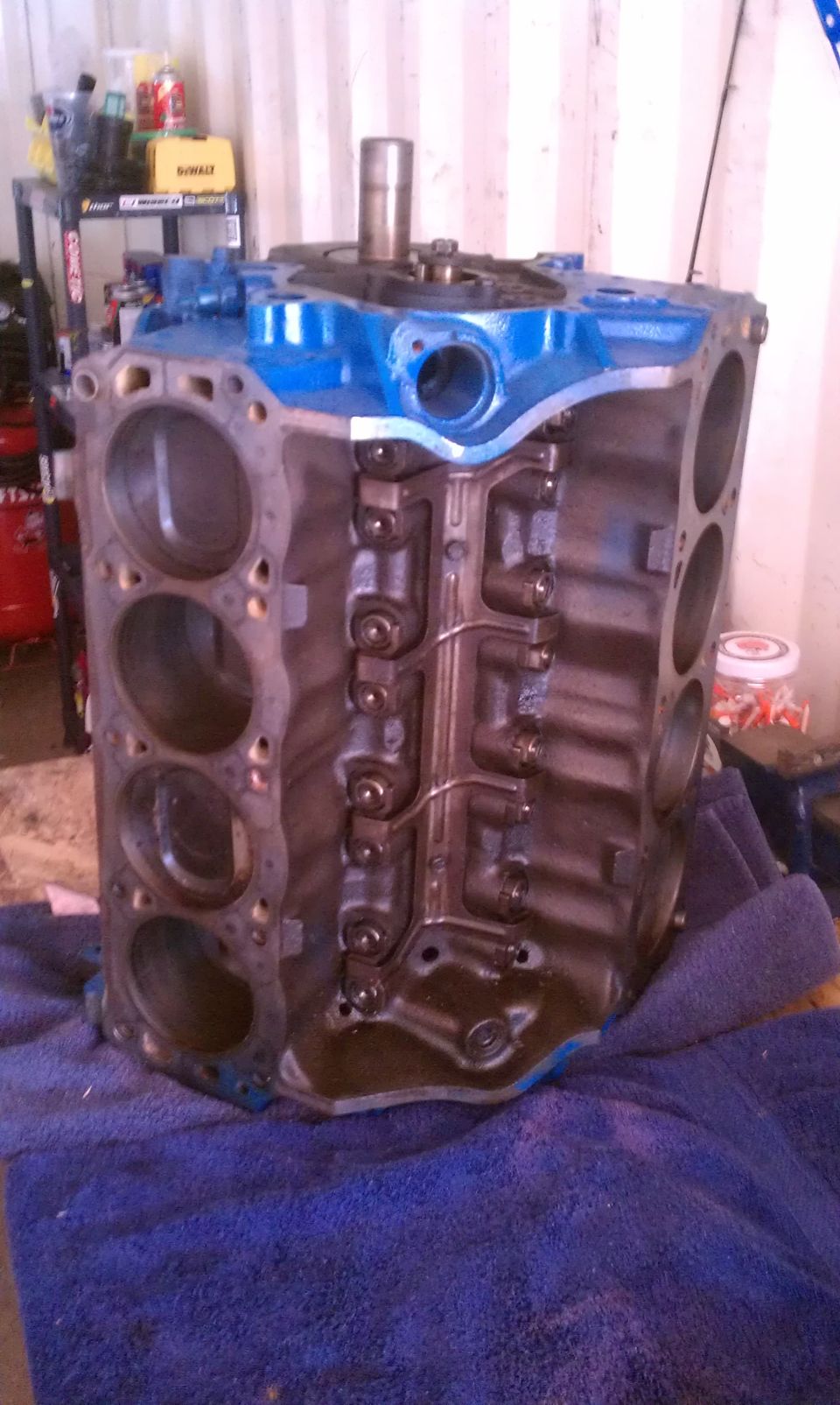 Blue engine block on a blue towel