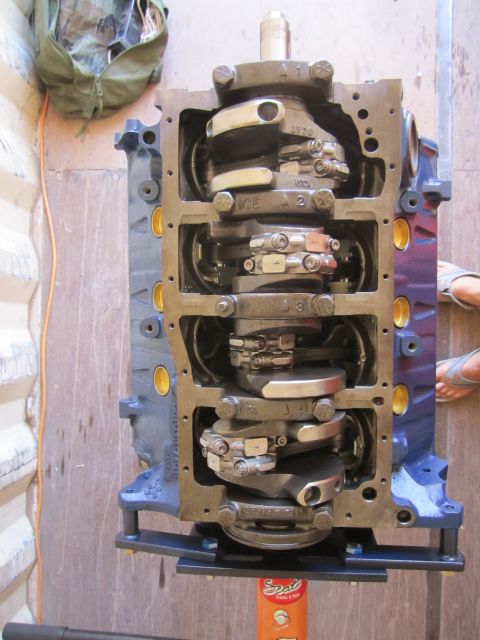 1996 Ford Bronco - Engine block assembly showing crankshaft and connecting rods, with Supermotors.net branding.