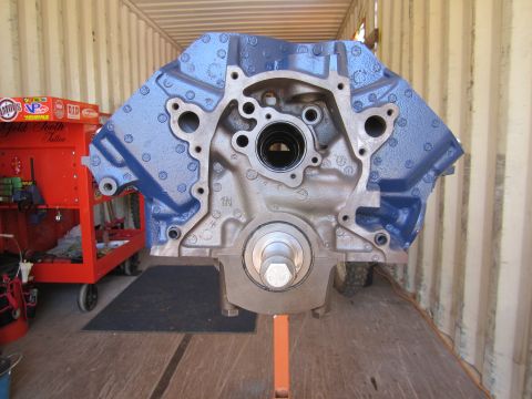1996 Ford Bronco - A blue engine block is mounted on a stand, with a red toolbox visible to the left.
