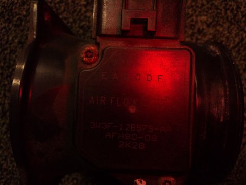 2004 Mercury Grand Marquis - Close-up of an air flow sensor, showing part number and date code.