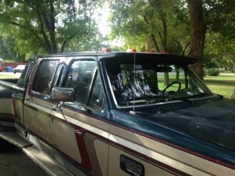 1986 Ford Bronco - This is a 1987 Ford F-350 truck, not a Bronco. It has a two-tone paint scheme and dual rear wheels.