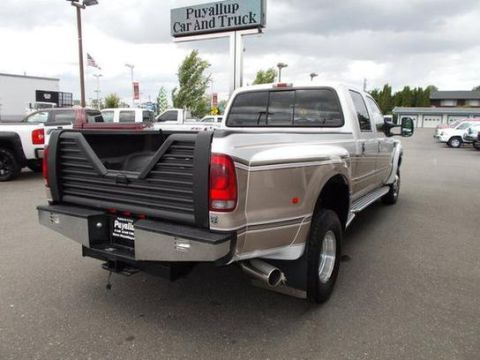 2001 Ford F-350 - This 2001 Ford F-350 pickup truck is shown from the rear, a custom bed liner and a chrome bumper.