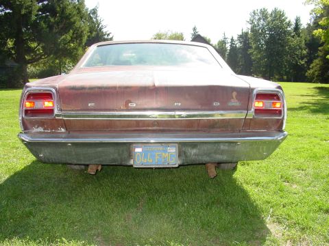 1969 Ford Fairlane - Rear view of a 1969 Ford Fairlane, showing its taillights and chrome bumper.