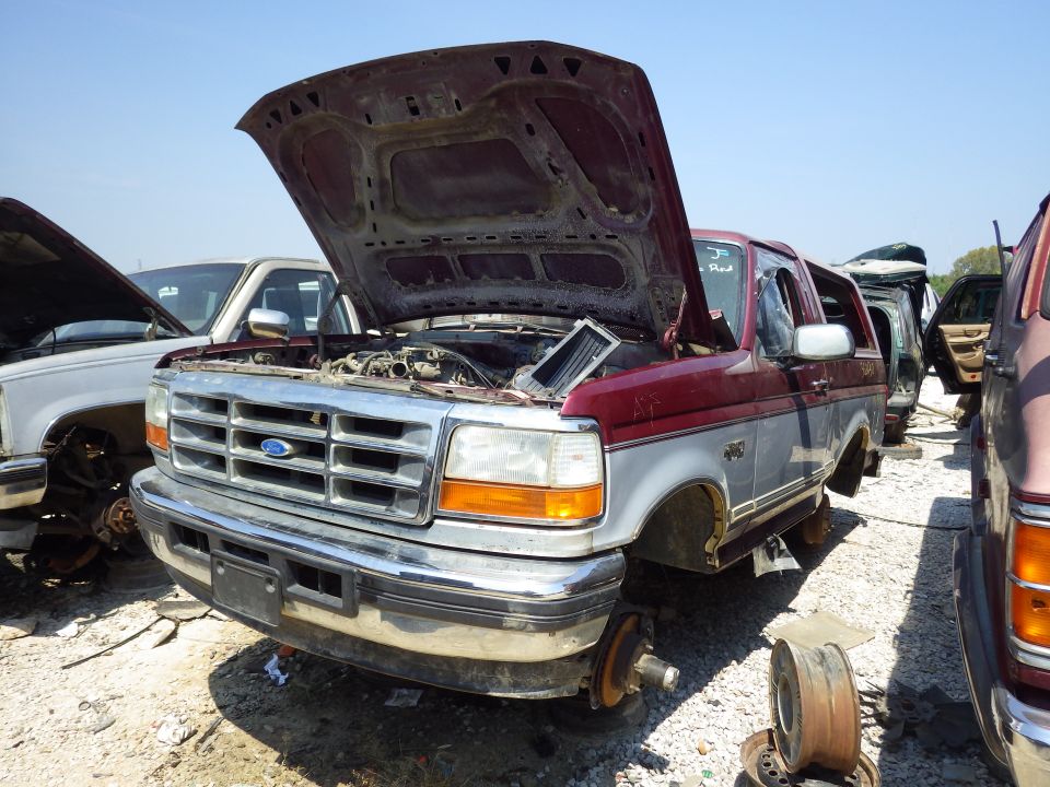 96 Bronco XLT 5.8L E4OD

The only useful parts I found on this catastrophe were the hard splash guards, but the LHF one was missing.

http://www.etis.ford.com/vehicleSelection.do#
Build Date:	  27.11.1995
Body Style:	  Double Cab (3/4 Door)
Version:	  150
Engine:	  5.8L OHV EFI V8 (NP)
Transmission:	  E4OD(4R100)
Drive:	  RHD RWD
Axle Ratio:	  3.55
Emission:	  With 49 State Emission Requirements
Air Conditioning:	  Manual Air Conditioning
Paint:	  Silver Frost
 Medium Opal Grey
 XLT
 Michigan Plant Built
 With Power Equipment Group
 With Privacy Glass
 With Heated Rear Window
 With Full Floor Console
 With Drivers Power Mirror
 With Passenger Power Convex Mirror
 With Heavy Duty Trailer Towing
 Double Cab (3/4 Door)
 With Body Tu-Tone Paint
 With Front License Plate Bracket
 With Exterior Tire Carrier
 7.5J x 15 Deep Dish Wheel
 With Super Engine Cooling System
 With Handling Package
 3.55
 Less Rear Axle Limited Slip Diff
 5.8L OHV EFI V8 (NP)
 Electric Trans Case And Auto Hubs
 With Tilt Steering Wheel
 With Tachometer
 Heavy Duty Battery
 Elect AM/FM/Stereo/Cassette/Clock
 With NAAO Radio Frequency
 With Light Group
 Dark Toreador
 Silver Frost