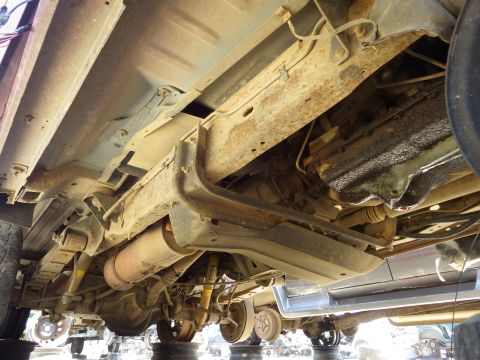 1983 Ford Bronco - 96 Bronco XLT 5.8L E4OD The only useful parts I found on this catastrophe were the hard splash guards, but the LHF one was missing.