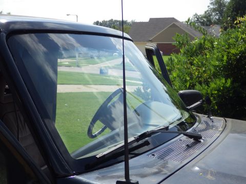 1983 Ford Bronco - I can see clearly, now - the cracks are gone... The w/s installer just left. I'll put the trim back on later, after I check for leaks. [url…