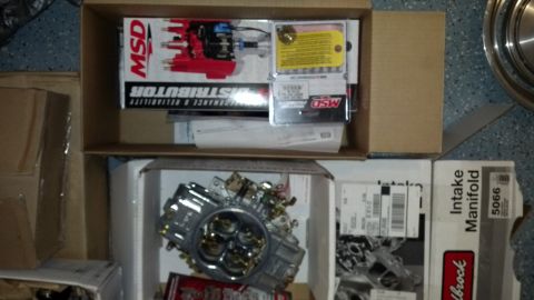 1970 Ford Torino - Boxes containing MSD distributor and carburetor parts are shown, with a SuperMotors logo visible.