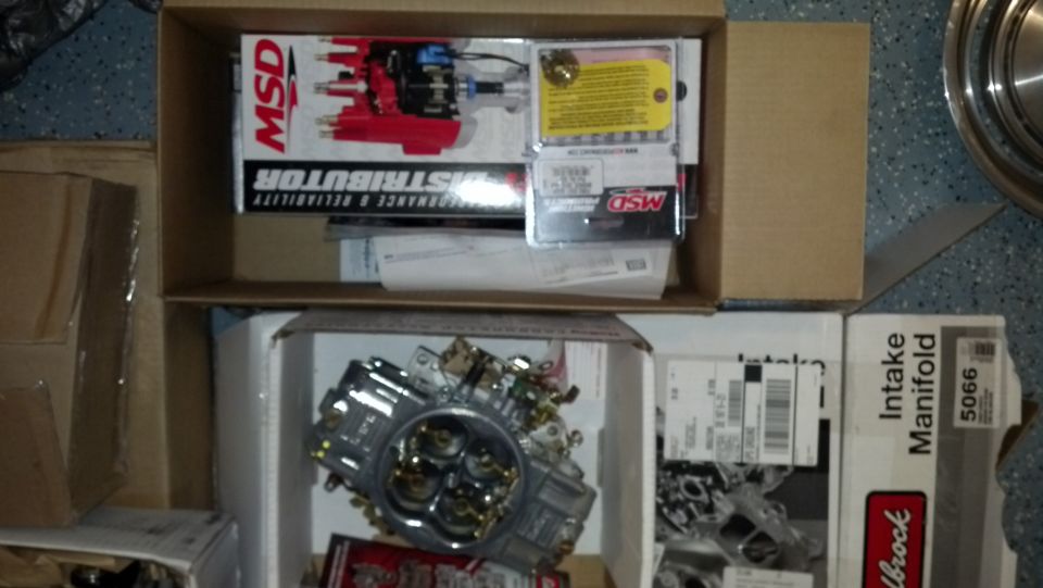 MSD distributor and carburetor in boxes