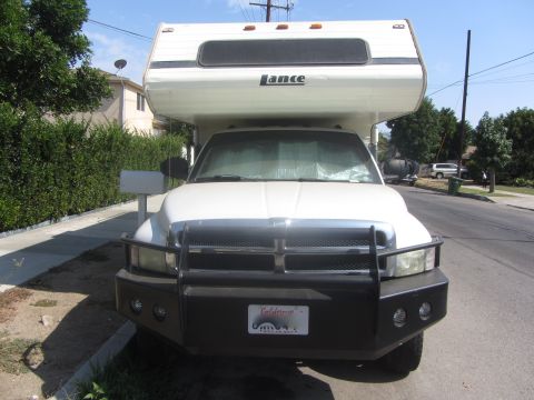 1997 Dodge 3500 - Front view of a 1997 Dodge 3500 pickup truck fitted with a Lance camper shell.