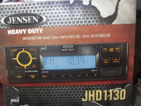 1997 Dodge 3500 - Jensen Heavy Duty car stereo, model JHD1130, shown on its product packaging.