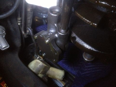 1978 Ford Bronco - This is a close-up view of a vehicle's oil pump assembly, showing some oil residue.