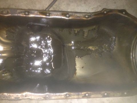 1978 Ford Bronco - This oil pan appears to be from a vehicle, but its specific make and model cannot be determined from the image.