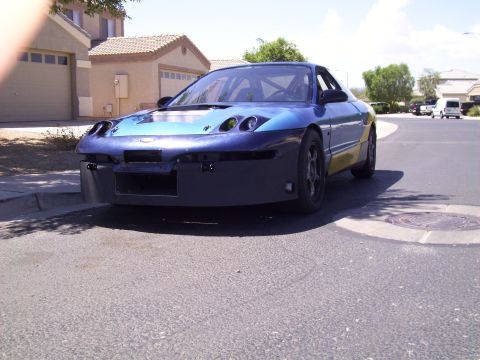 1995 Ford Probe - This modified 1995 Ford Probe appears to be set up for racing, with a roll cage and custom front bumper.