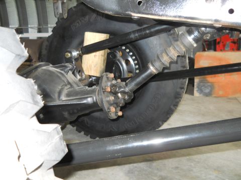 1992 Ford Bronco - Rear axle and suspension parts are visible in this close-up shot of a vehicle's undercarriage.