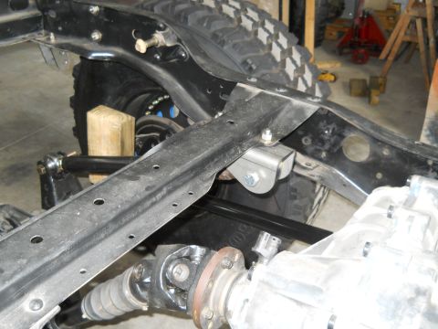 1992 Ford Bronco - Vehicle frame and drivetrain components are shown in this close-up image.