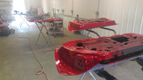 1972 Pontiac Trans Am - Car doors undergoing paint work in a garage setting.