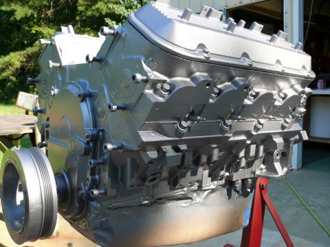 1976 Chevrolet Corvette - Engine block on a red stand, ready for installation.