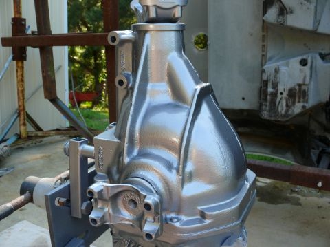 1976 Chevrolet Corvette - Differential housing painted silver, mounted on a stand for work.