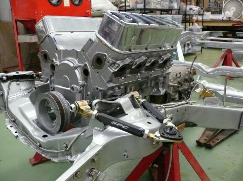 1976 Chevrolet Corvette - Engine and chassis assembly, likely for a classic car restoration, an engine block and suspension components.