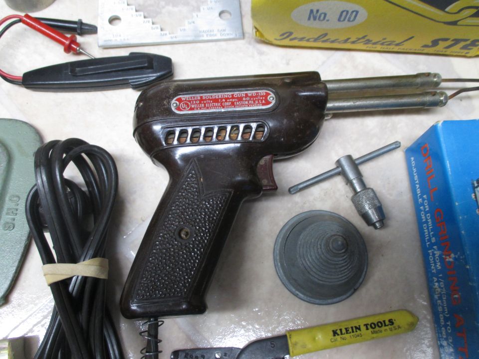 Weller soldering gun with cord, tap handle, and Klein Tools wrench