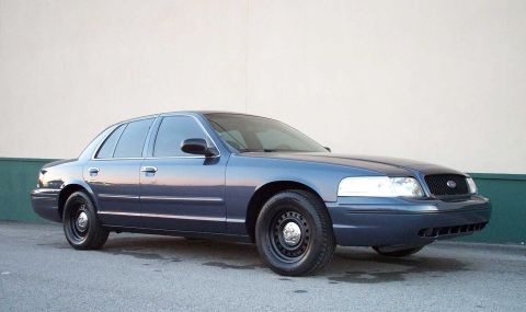 1998 Ford Crown Victoria - This 1998 Ford Crown Victoria sedan is shown from a 3/4 front angle.