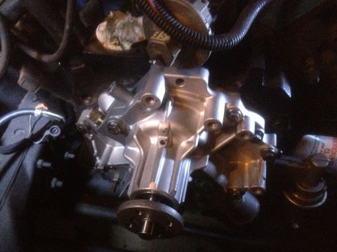 1978 Ford Bronco - Close-up of an engine water pump, a critical component for cooling the engine.