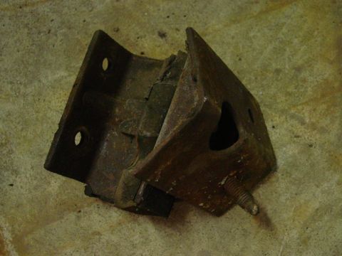 1969 Ford Fairlane - This is a rusted engine mount bracket, likely for an older vehicle.