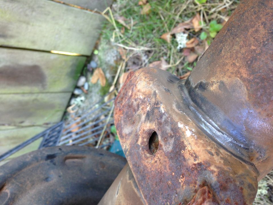 I wire wheeled the welds on the spring perches to see if they were bad. They look godd, but they still might need to be repaired or removed.