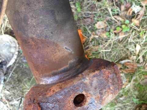 1992 Ford F-150 - I wire wheeled the welds on the spring perches to see if they were bad. They look godd, but they still might need to be repaired or removed.
