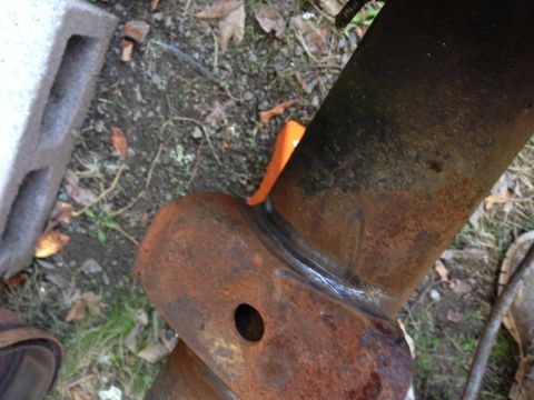 1992 Ford F-150 - I wire wheeled the welds on the spring perches to see if they were bad. They look godd, but they still might need to be repaired or removed.
