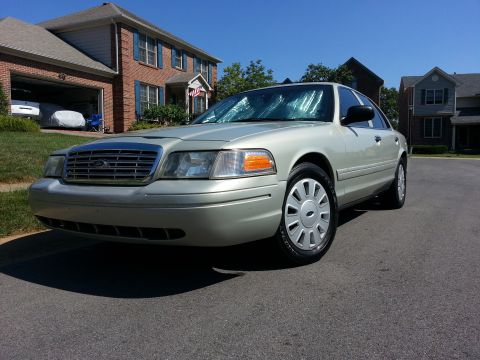 2004 Ford Crown Victoria - 2006 17" wheels and wheel covers, and new grille.