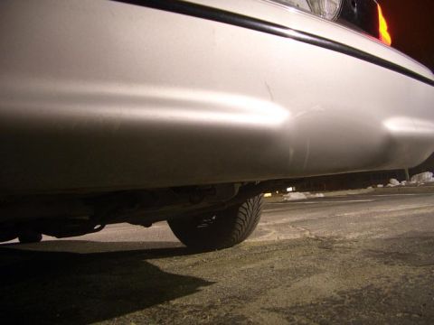 1999 Ford Crown Victoria - This is a close up of scratches on the rear bumper, from parking lots, overall very minor