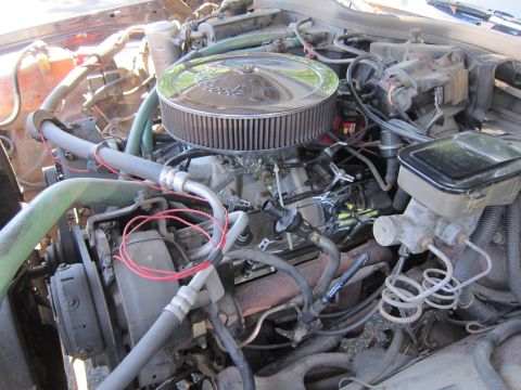 2001 Ford Crown Victoria - Close-up view of an engine bay, showing various components and wiring.