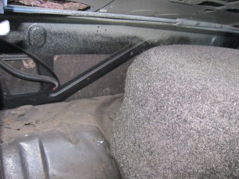 2001 Ford Crown Victoria - Photograph of a car trunk interior, not a technical document.