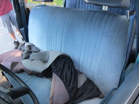 2001 Ford Crown Victoria - Photograph of a car's blue bench seat, not a technical document.