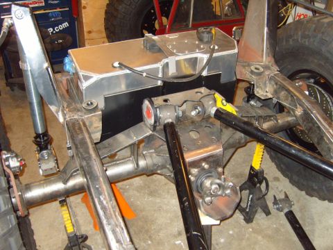 1985 Jeep CJ7 - Custom fuel tank and suspension components are visible, suggesting a modified vehicle build.