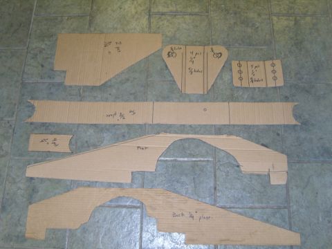 1985 Jeep CJ7 - Cardboard templates show cutouts for vehicle body panels, including fender flares, with handwritten measurements and labels.
