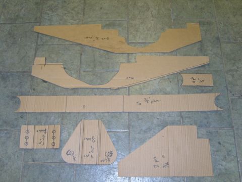 1985 Jeep CJ7 - Cardboard templates with handwritten notes are spread across a tiled floor.