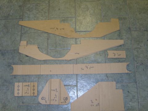 1985 Jeep CJ7 - These cardboard templates appear to be for custom vehicle parts, possibly for a floor pan or body panel.