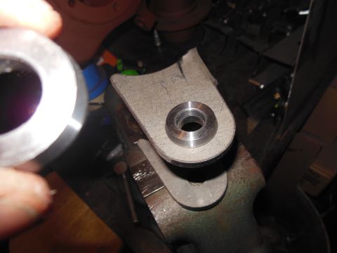 1985 Jeep CJ7 - Close-up of metal parts being worked on in a vise.