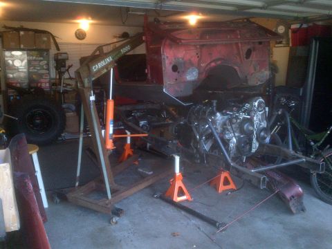 1985 Jeep CJ7 - 1985 Jeep CJ7 undergoing restoration, engine removed and body on stands.