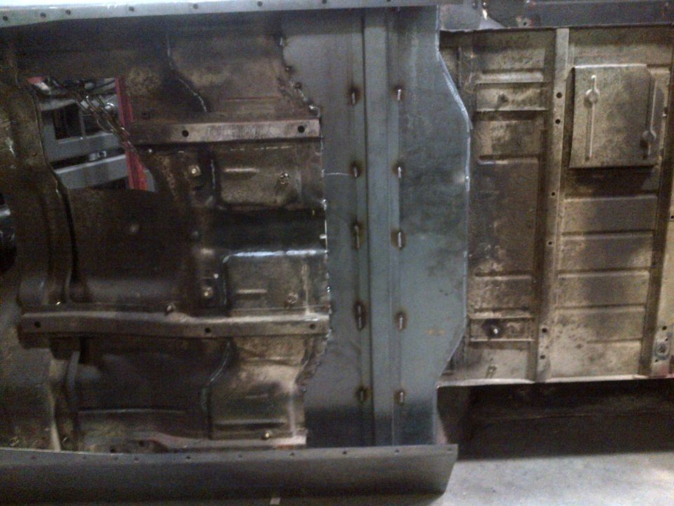 Jeep CJ7 chassis with new metal panels welded to the floor pan and rocker panel