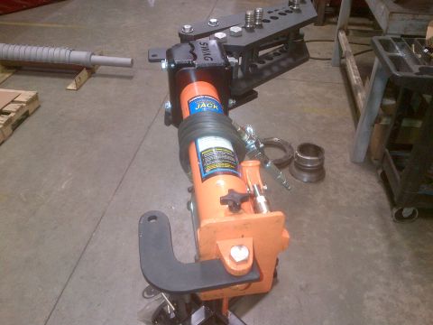 1985 Jeep CJ7 - Hydraulic tube bender with multiple die sizes and a SWAG label is shown in a workshop setting.