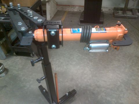 1985 Jeep CJ7 - Hydraulic ram attached to a tube bender, with "SWAG" branding visible.