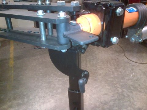 1985 Jeep CJ7 - Close-up of a metal tube bender assembly, various bolts and brackets.