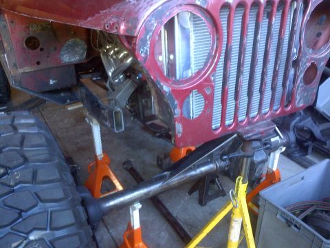 1985 Jeep CJ7 - This Jeep's front end is disassembled and supported by jack stands for maintenance or modification.