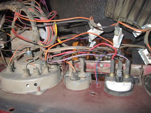 1985 Jeep CJ7 - A complex web of wires and connectors is visible on the vehicle's dashboard.